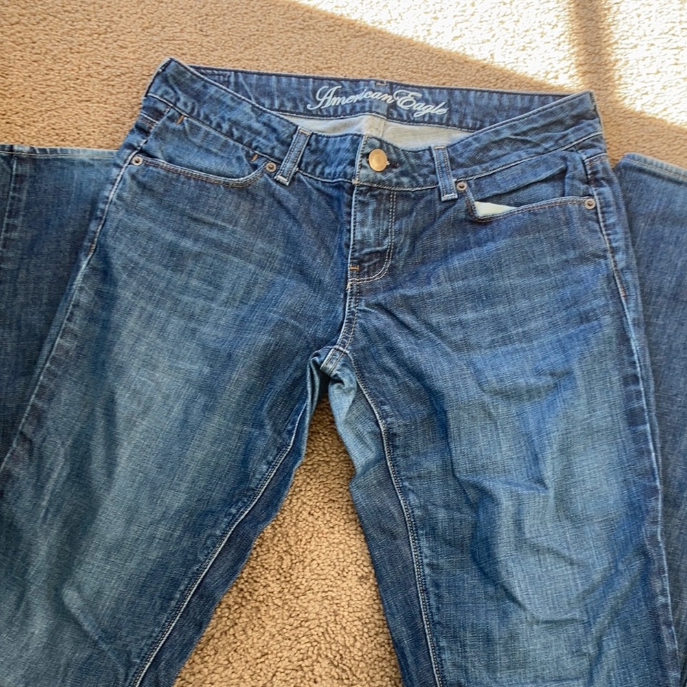 Regular, standard fit. Used. Wear at bottom of jeans are done on purpose.